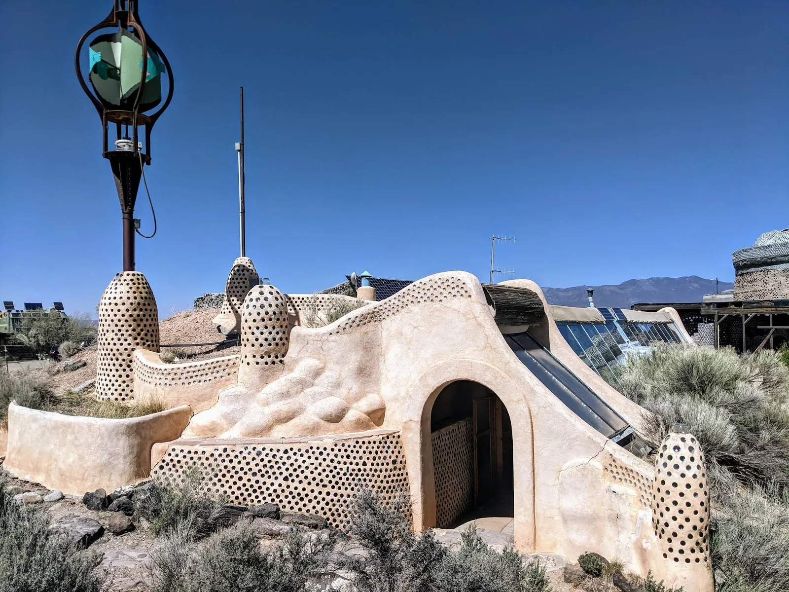 Photograph of Earthship at Greater World Earthship Community, New Mexico.