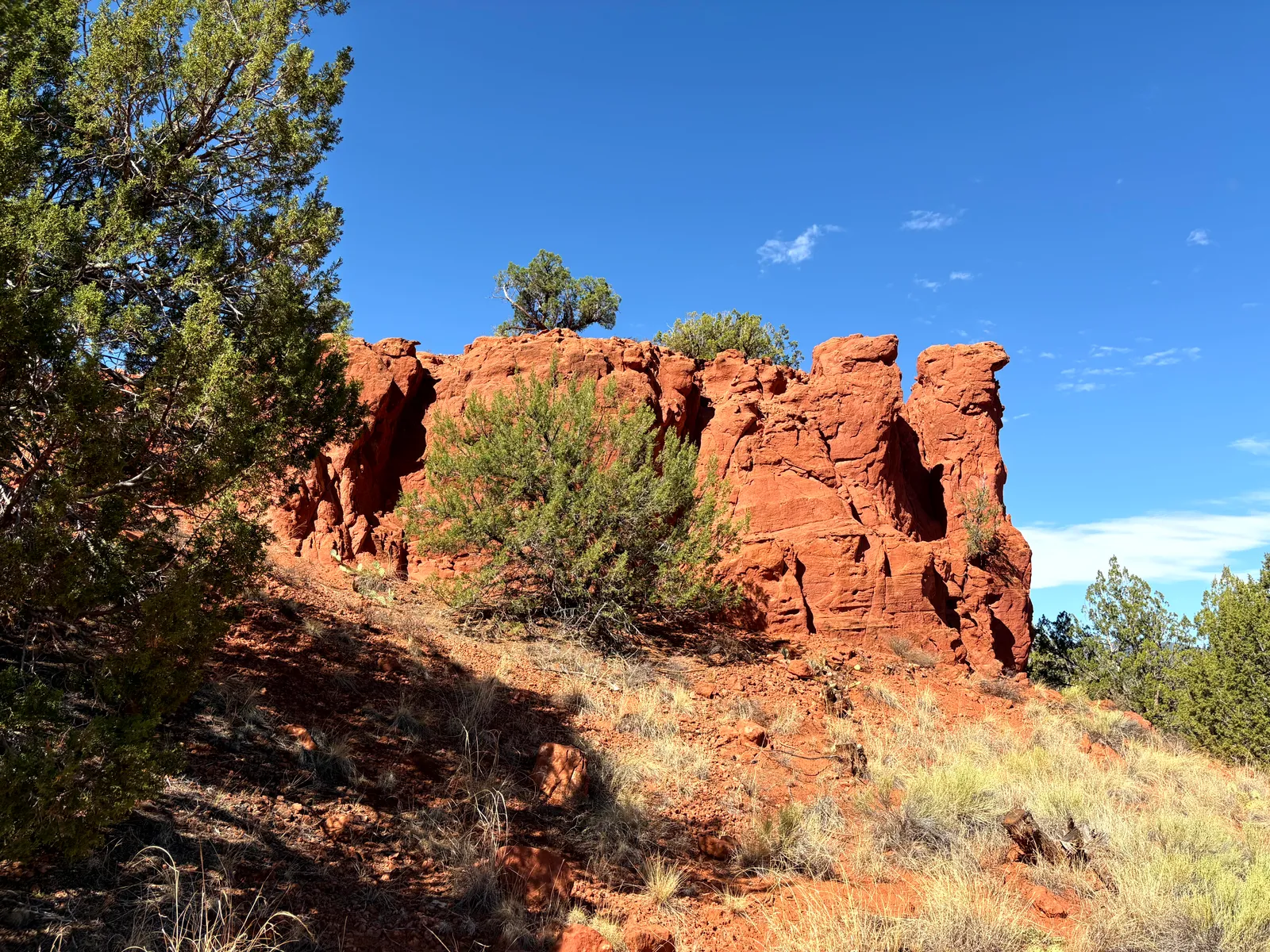 Red sandstone walls of Walatowa Slot Canyon